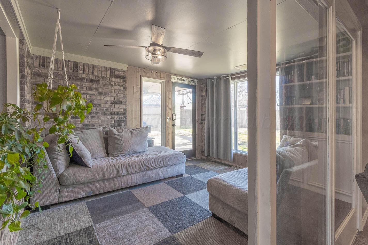 428 Overland Trail Fritch, TX 79036 - Photo 21 of 24 a living room with furniture and a large window