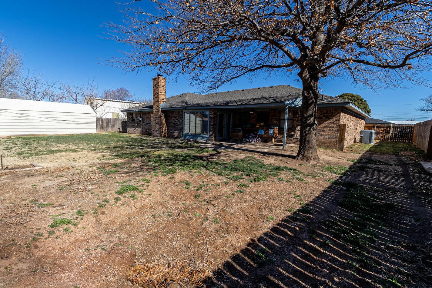 428 Overland Trail Fritch, TX 79036 - Photo 23 of 24 a front view of a house with a yard