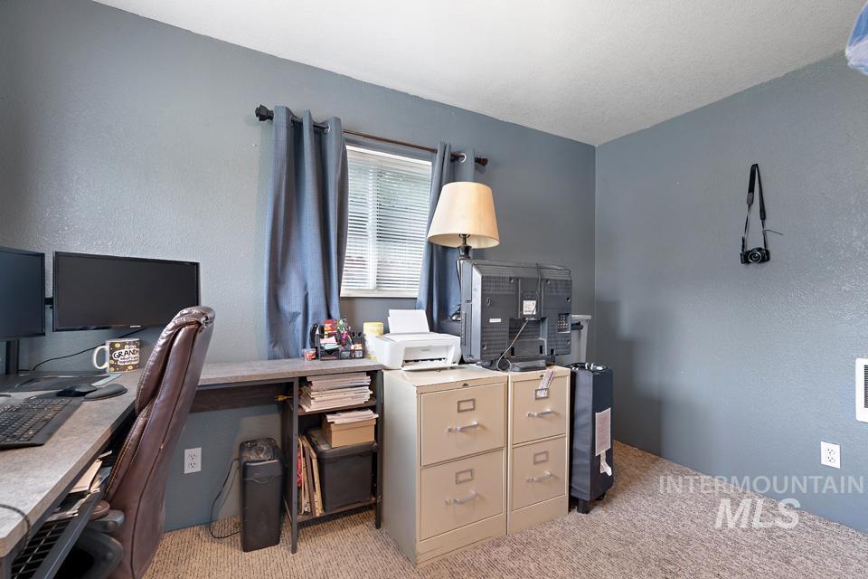 1015 East Park Street Weiser, ID 83672 - Photo 29 of 30 Office with light colored carpet and a textured wall