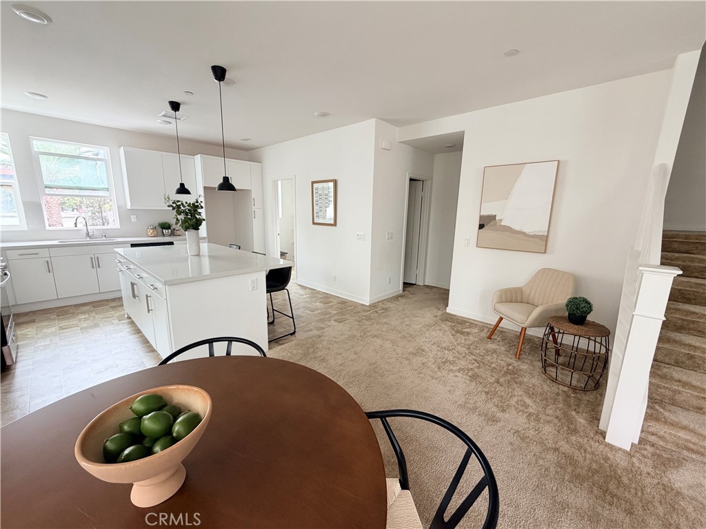 771 South Grable Circle Orange, CA 92868 - Photo 7 of 18 a living room with furniture a rug and a window