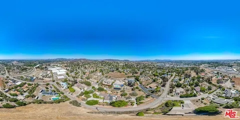 a pathway with a garden