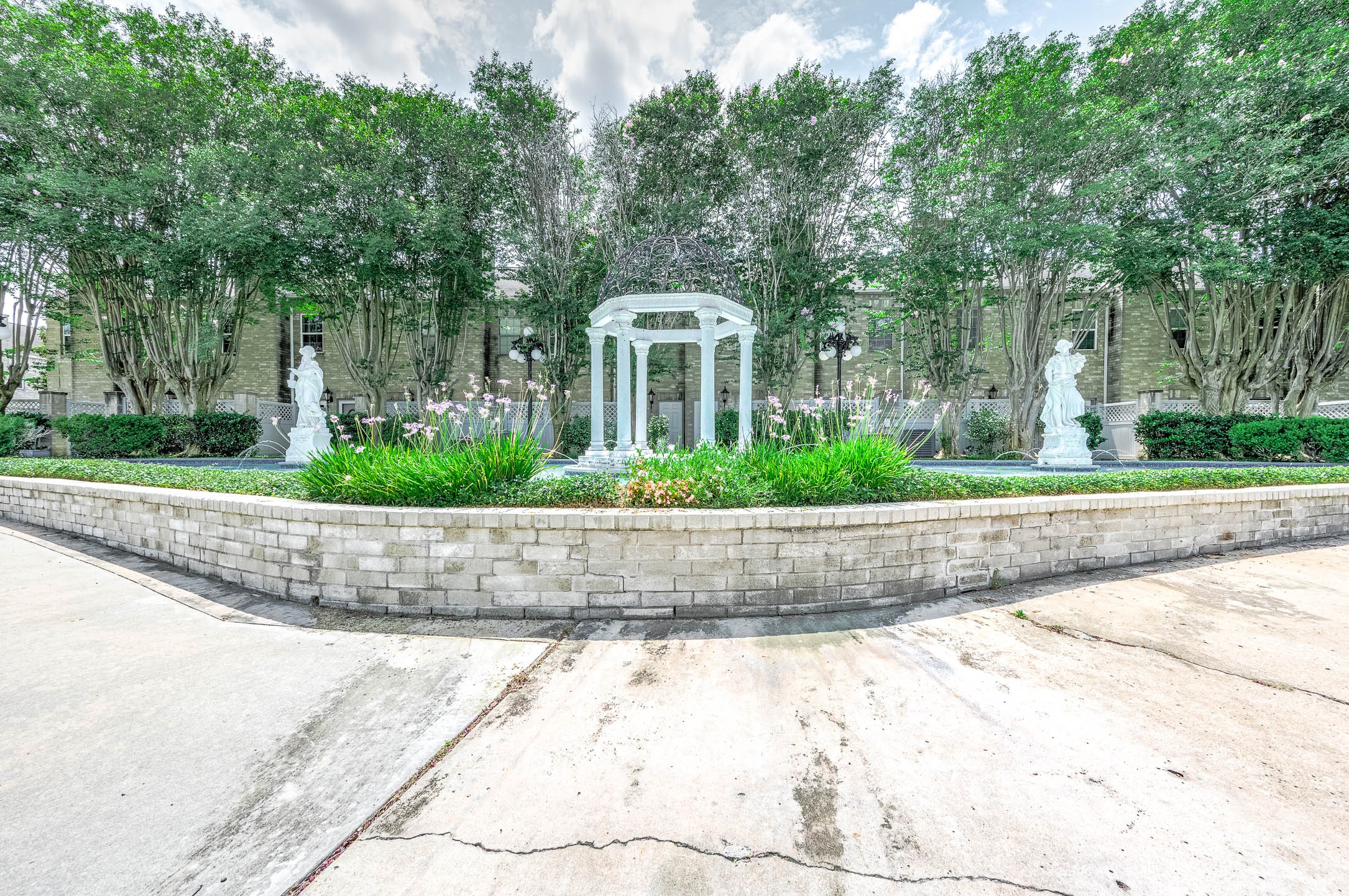 6000 Reims Road, Unit 2003 Houston, TX 77036 - Photo 1 of 24 a front view of a house with a yard
