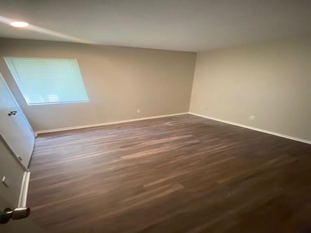 4579 Buffer Drive Memphis, TN 38128 - Photo 9 of 13 an empty room with wooden floor and entrance