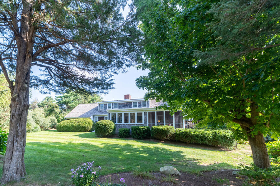 7 Point Hill Road West Barnstable, MA 02668 - Photo 11 of 28 a front view of a house with garden