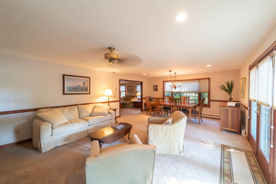 7 Point Hill Road West Barnstable, MA 02668 - Photo 19 of 28 a living room with furniture and a flat screen tv
