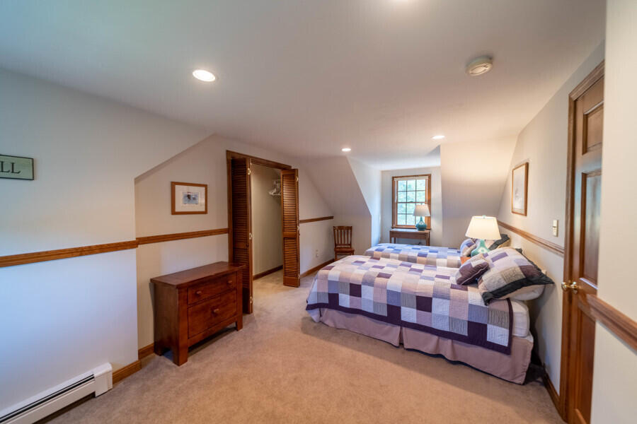 7 Point Hill Road West Barnstable, MA 02668 - Photo 21 of 28 a bedroom with bed and wooden floor