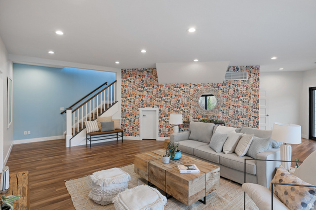 1263 Chapman Court Alpine, UT 84004 - Photo 68 of 83 Living area featuring wood finished floors, an accent wall, recessed lighting, and wallpapered walls