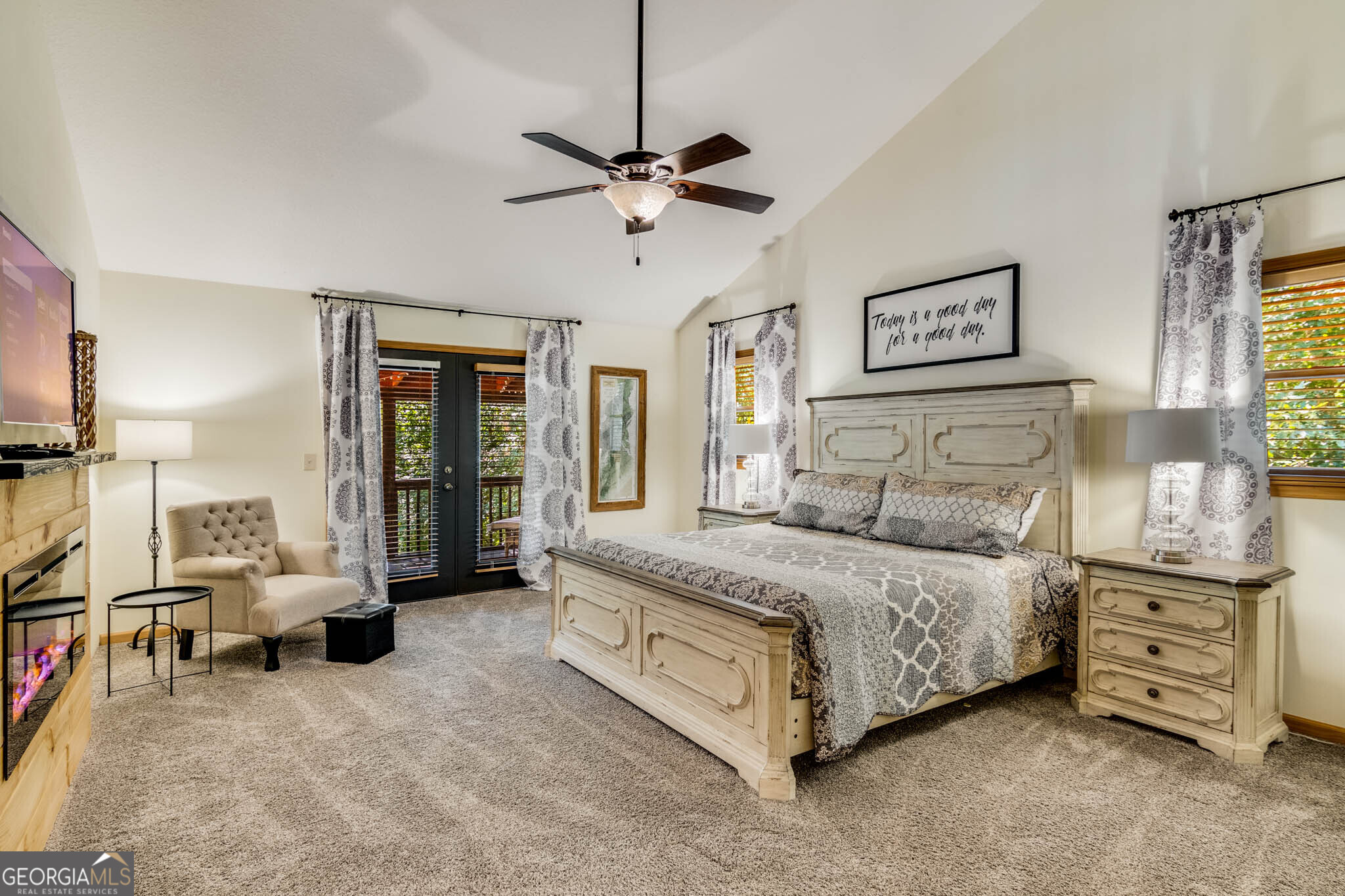 119 Summit Street, Unit 158R Ellijay, GA 30540 - Photo 14 of 64 a spacious bedroom with a bed a couch and a window