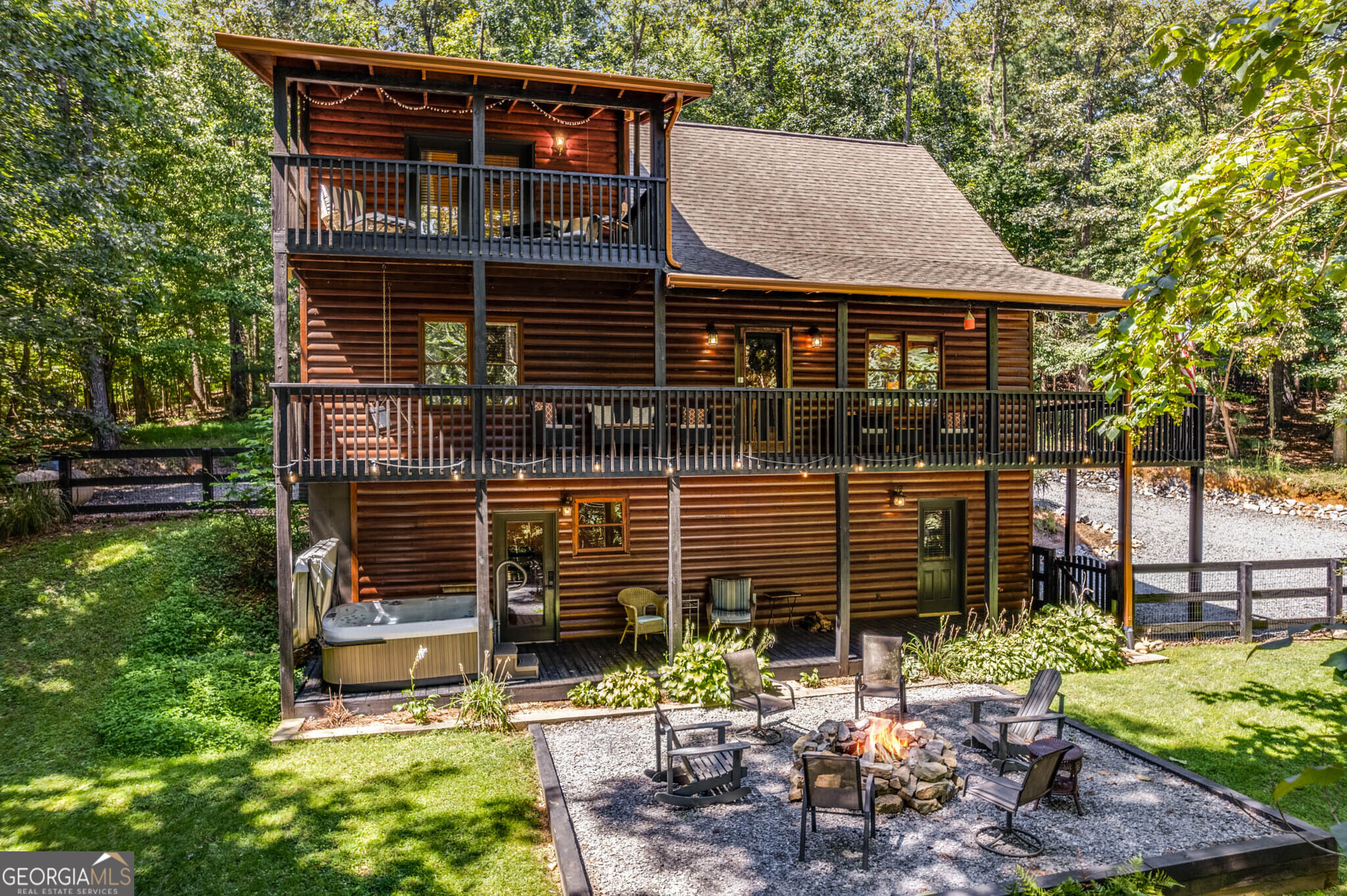 119 Summit Street, Unit 158R Ellijay, GA 30540 - Photo 2 of 64 a backyard of a house with yard and outdoor seating