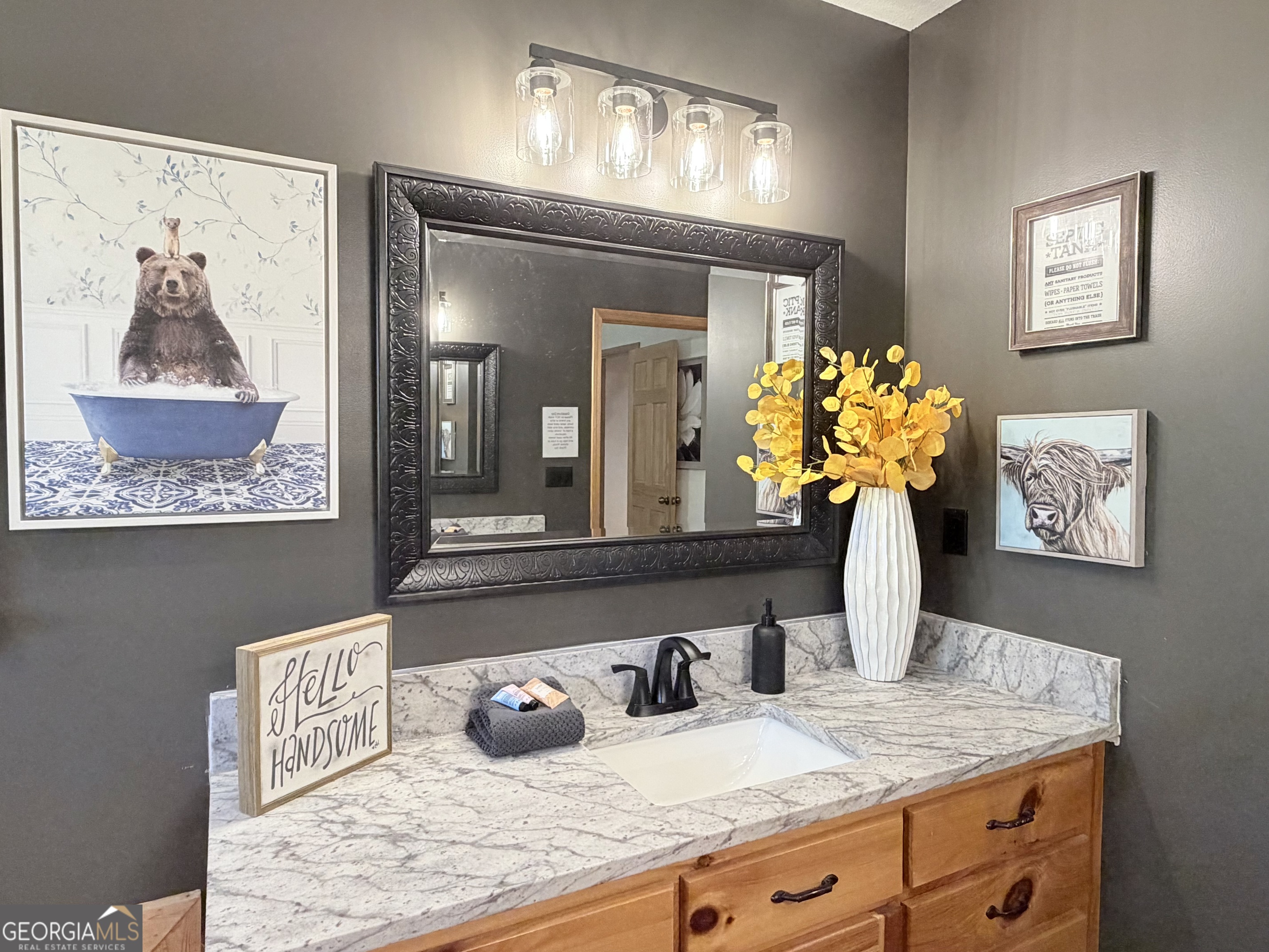 119 Summit Street, Unit 158R Ellijay, GA 30540 - Photo 23 of 64 a bathroom with a sink a vanity and a mirror