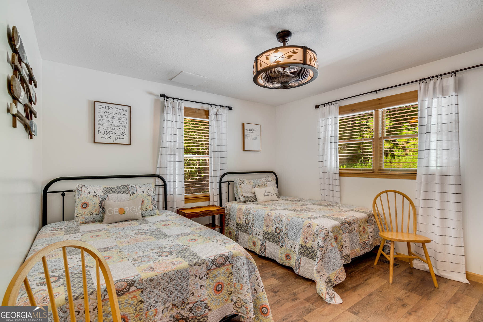 119 Summit Street, Unit 158R Ellijay, GA 30540 - Photo 30 of 64 a bedroom with two beds and a chandelier