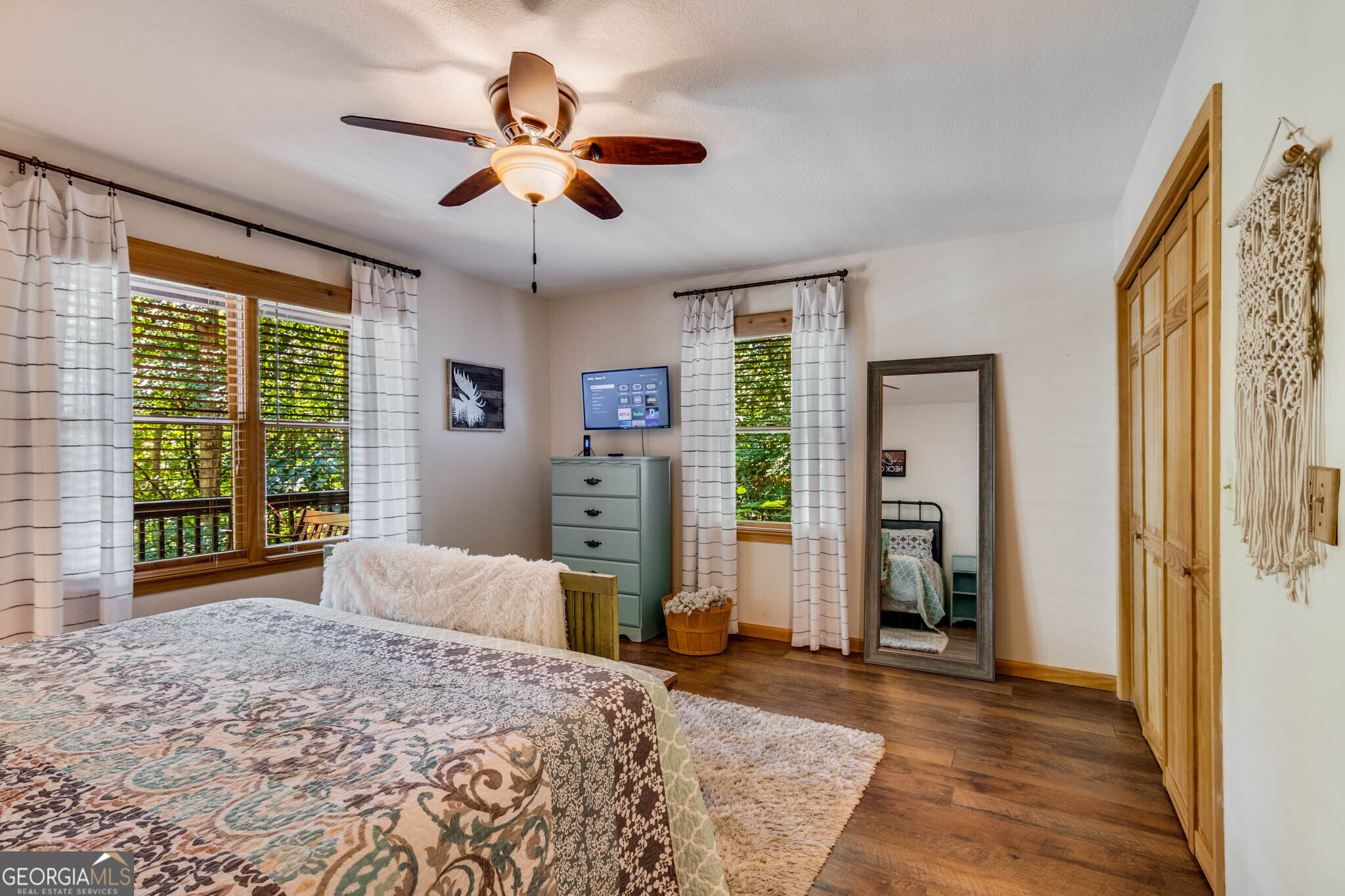 119 Summit Street, Unit 158R Ellijay, GA 30540 - Photo 31 of 64 a bedroom with a balcony a bed and a large window with outer view