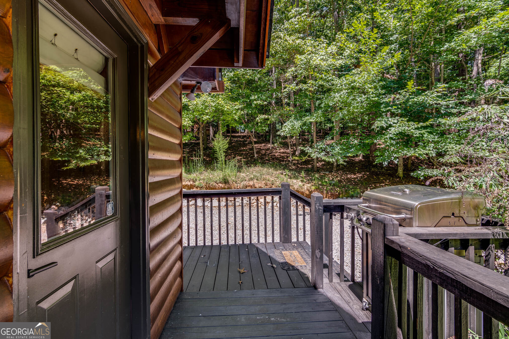 119 Summit Street, Unit 158R Ellijay, GA 30540 - Photo 4 of 64 a view of a balcony with wooden floor