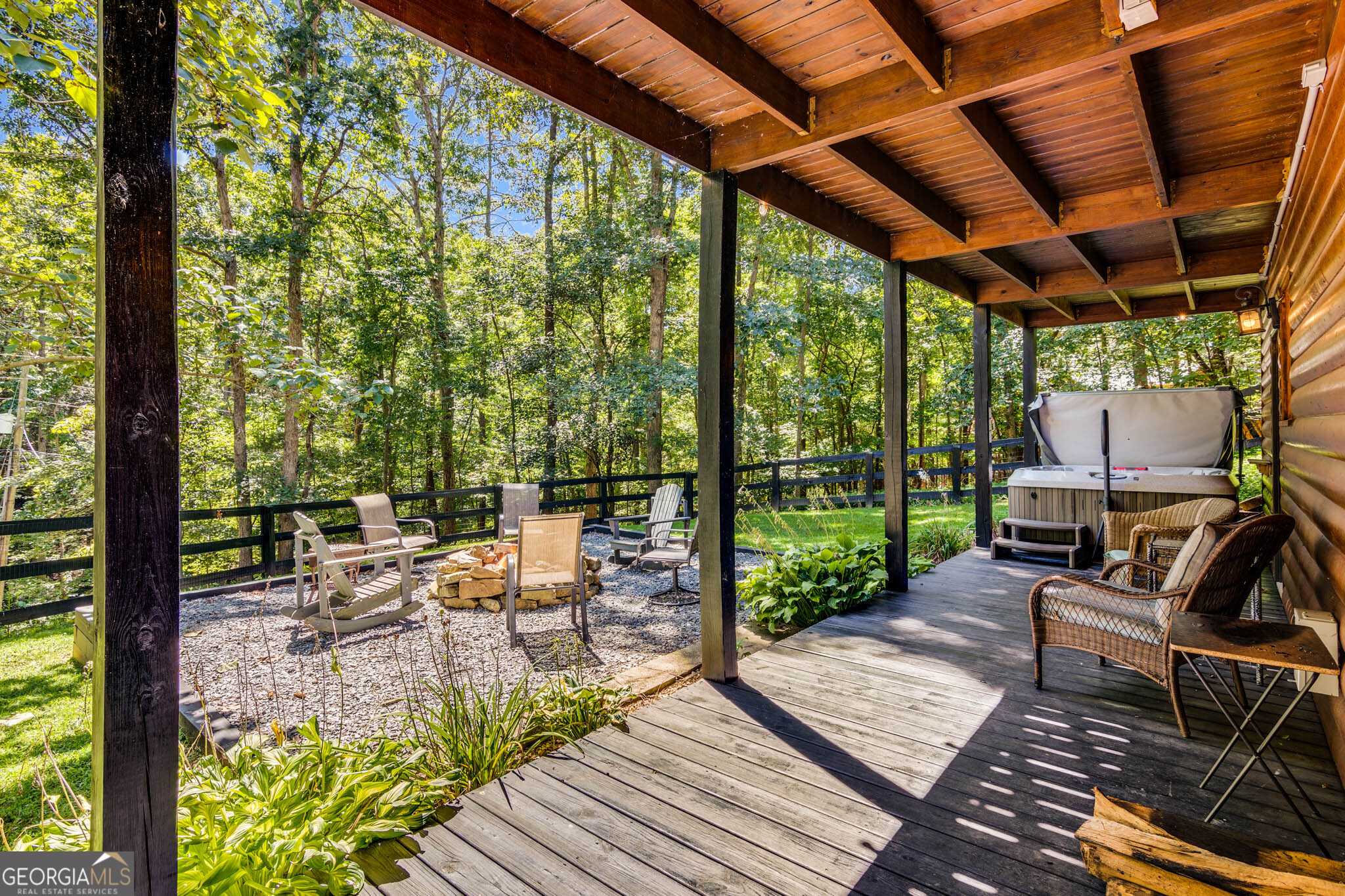 119 Summit Street, Unit 158R Ellijay, GA 30540 - Photo 45 of 64 a view of a patio with chairs and wooden floor