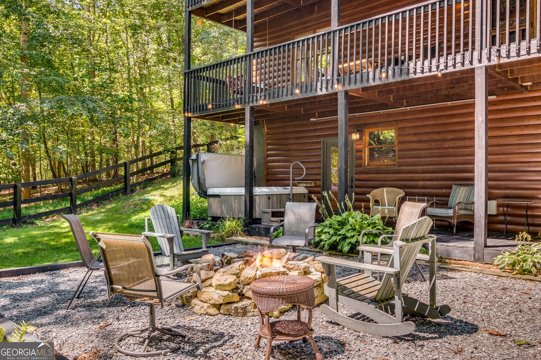 119 Summit Street, Unit 158R Ellijay, GA 30540 - Photo 47 of 64 a view of a chairs and table in backyard