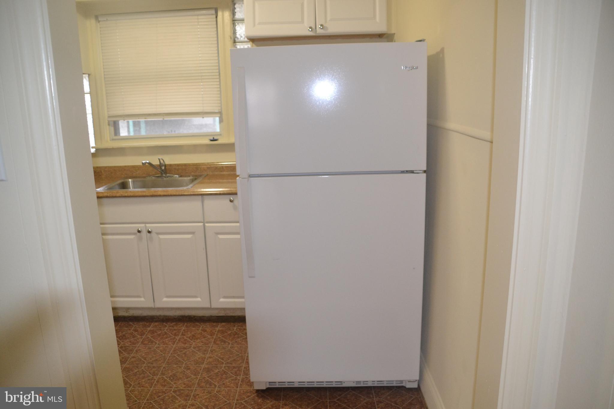 6936 Guilford Road Upper Darby, PA 19082 - Photo 14 of 37 Kitchen with refrigerator.
