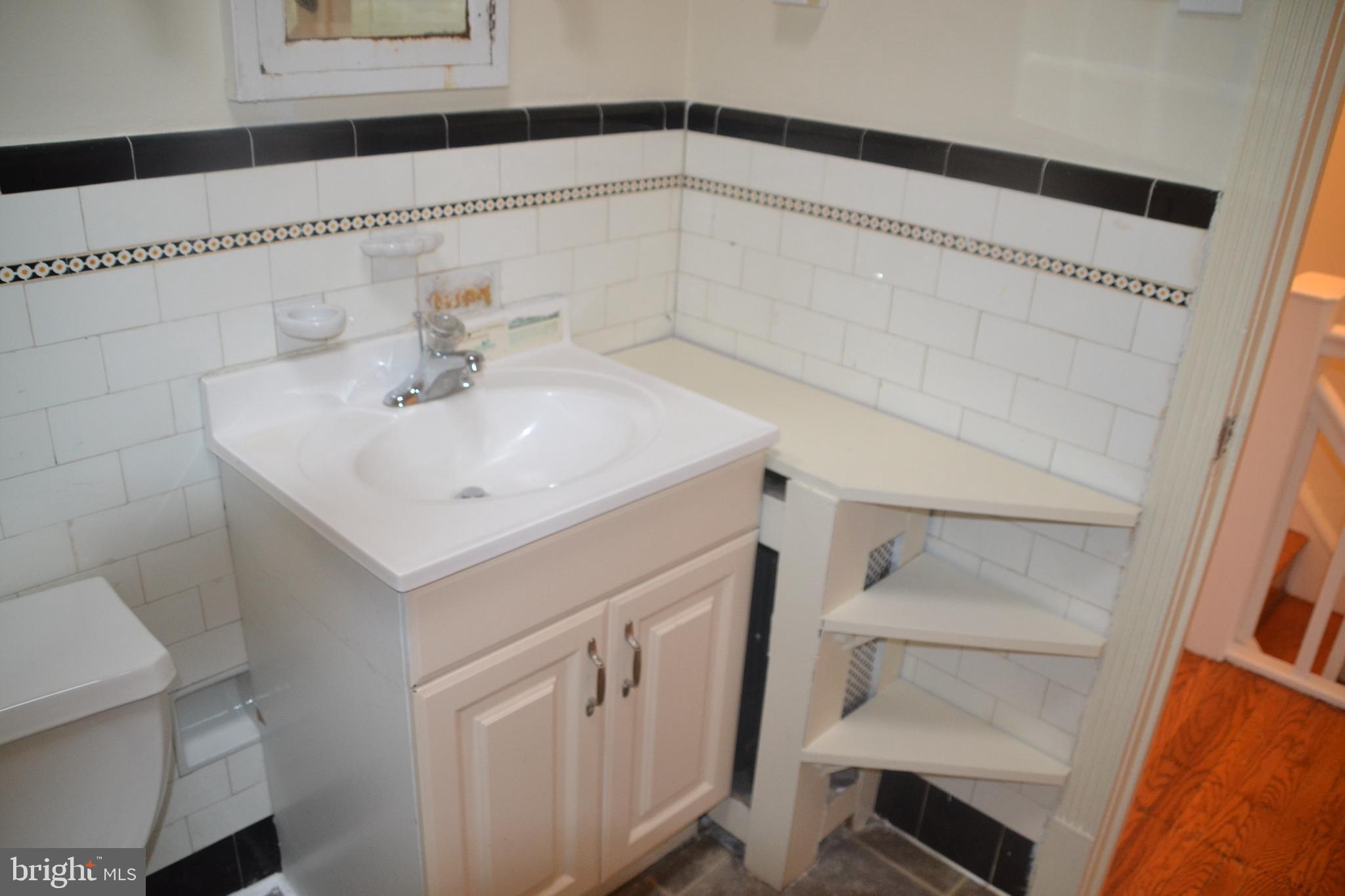 6936 Guilford Road Upper Darby, PA 19082 - Photo 15 of 37 Vanity in hall bathroom.