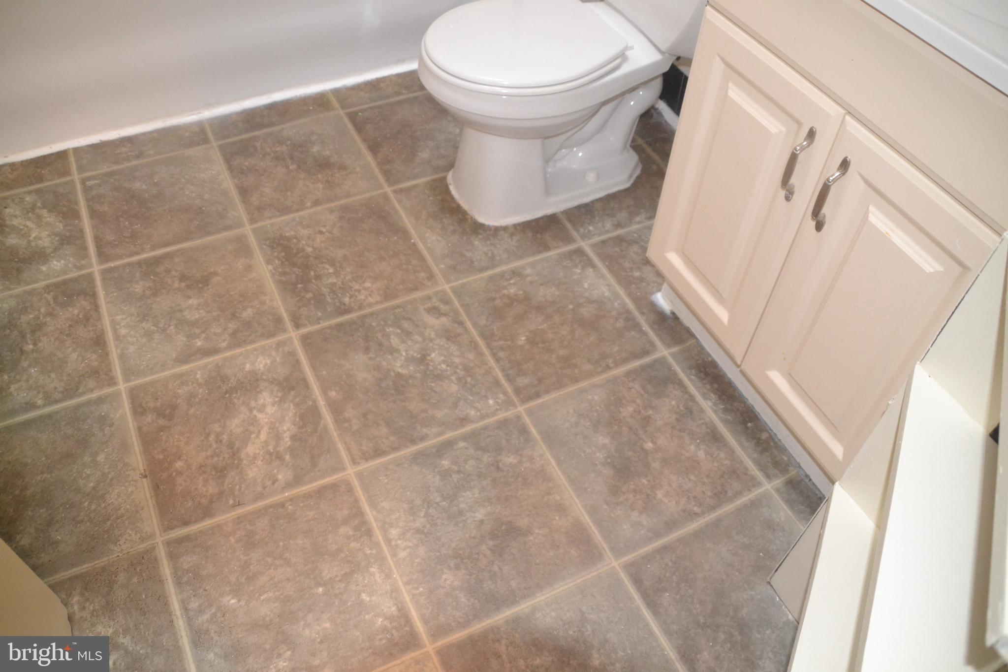 6936 Guilford Road Upper Darby, PA 19082 - Photo 18 of 37 Bathroom with tile flooring.