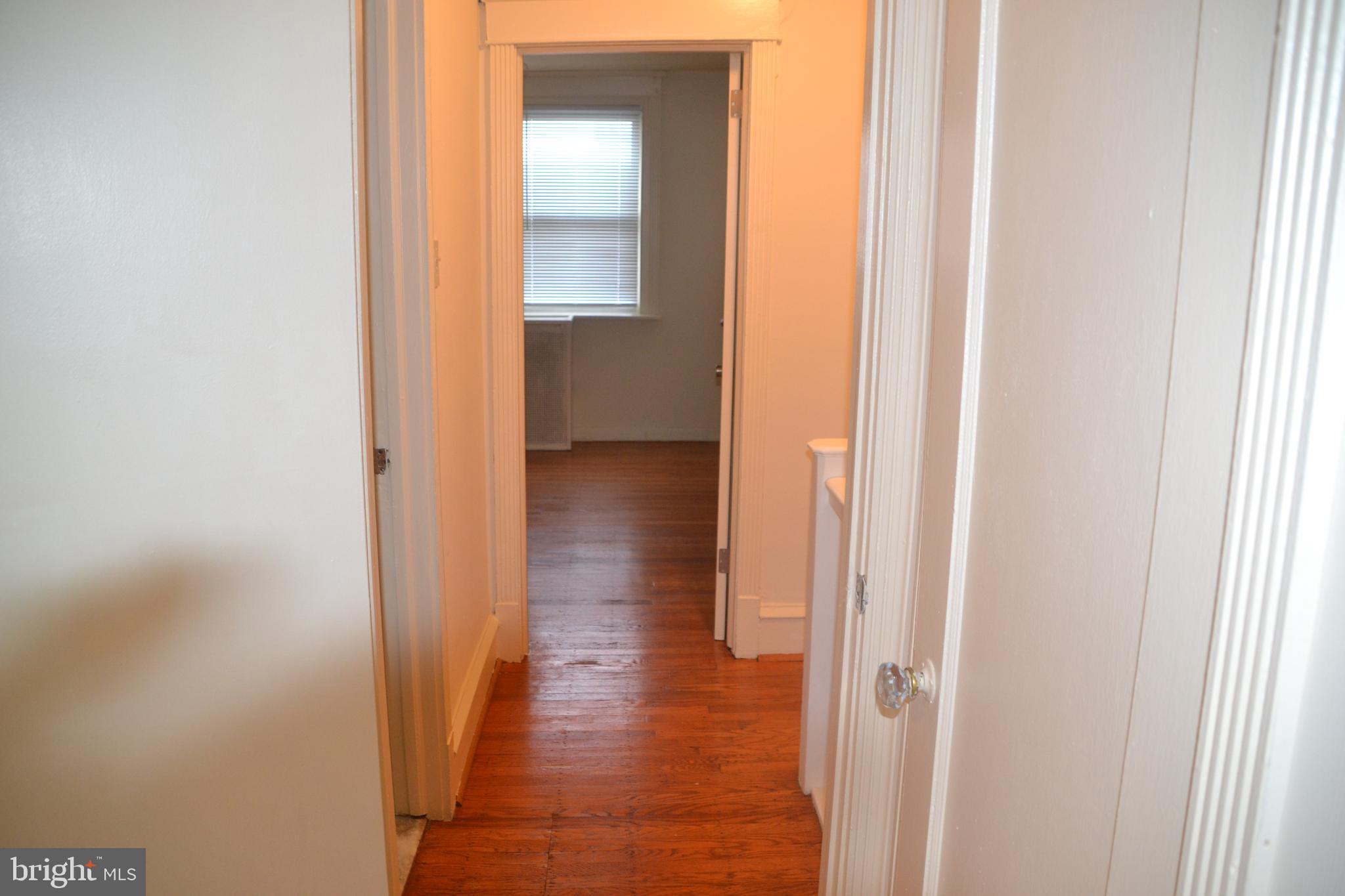 6936 Guilford Road Upper Darby, PA 19082 - Photo 22 of 37 Hall way with hard wood flooring.
