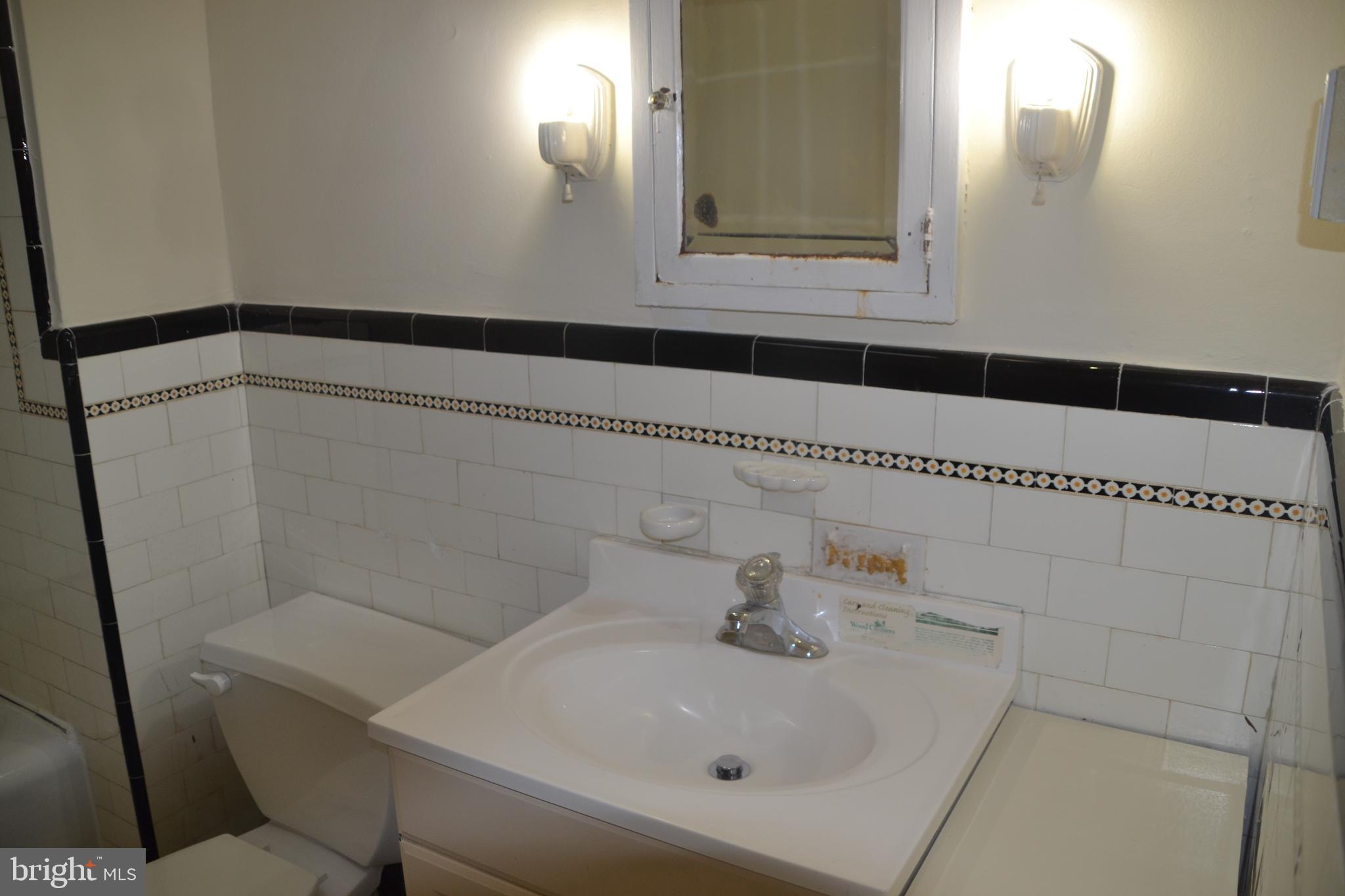 6936 Guilford Road Upper Darby, PA 19082 - Photo 23 of 37 Vanity in hall bathroom.