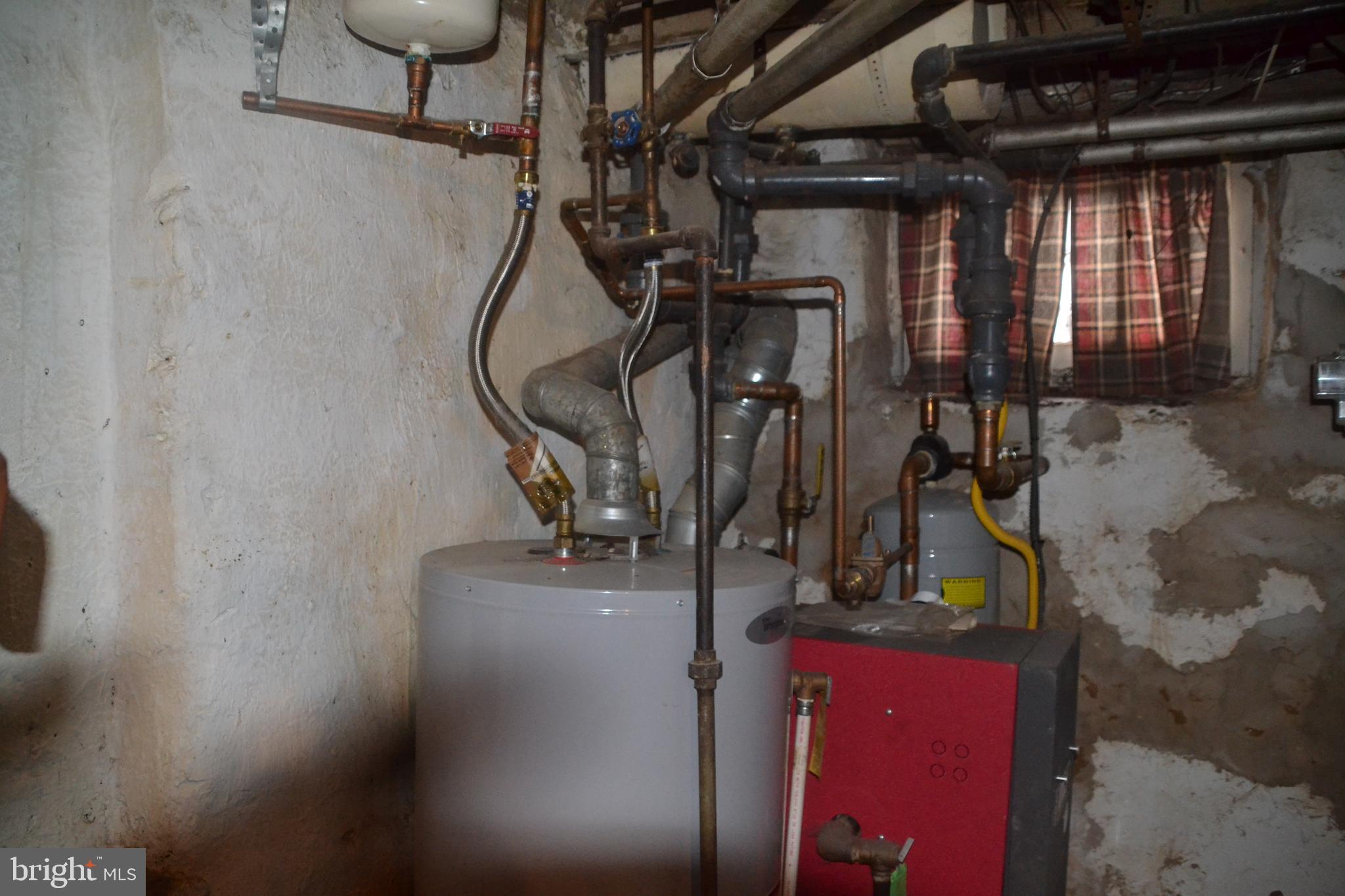 6936 Guilford Road Upper Darby, PA 19082 - Photo 36 of 37 Gas heater and water heater.