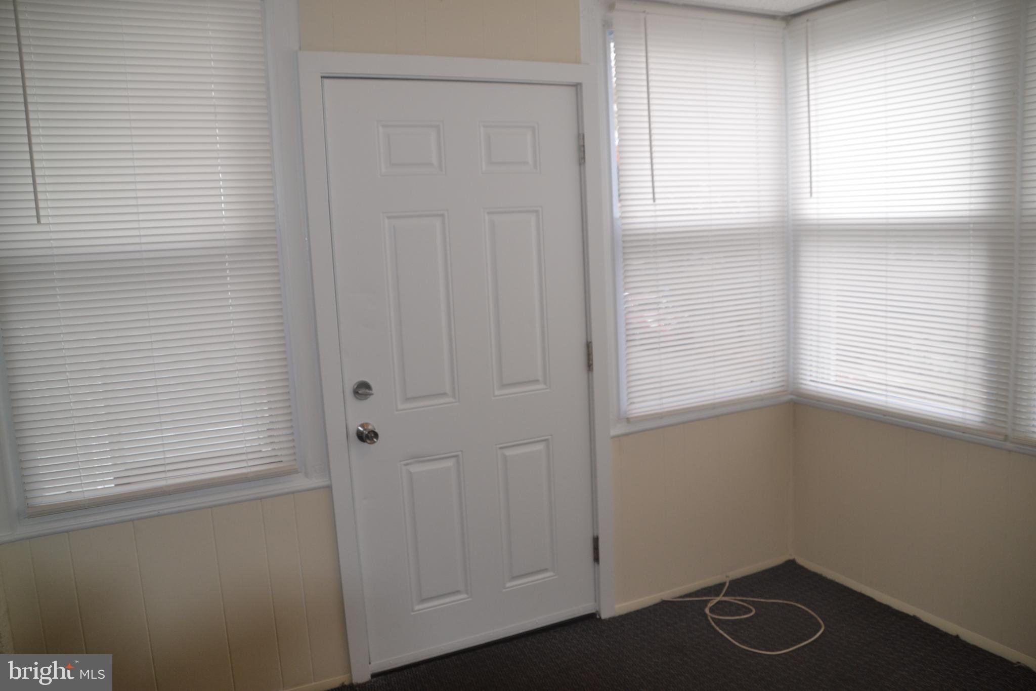 6936 Guilford Road Upper Darby, PA 19082 - Photo 4 of 37 View of the enclosed front porch.