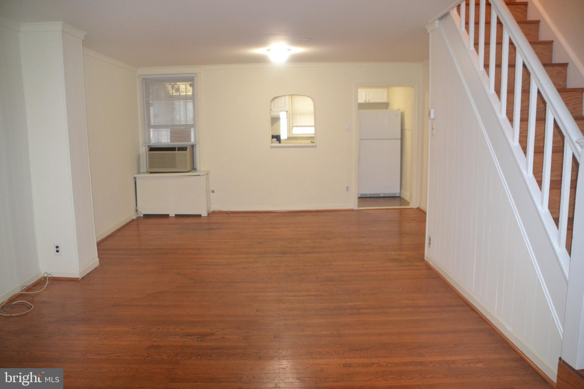 6936 Guilford Road Upper Darby, PA 19082 - Photo 6 of 37 View of the living room and dining room with h/w.
