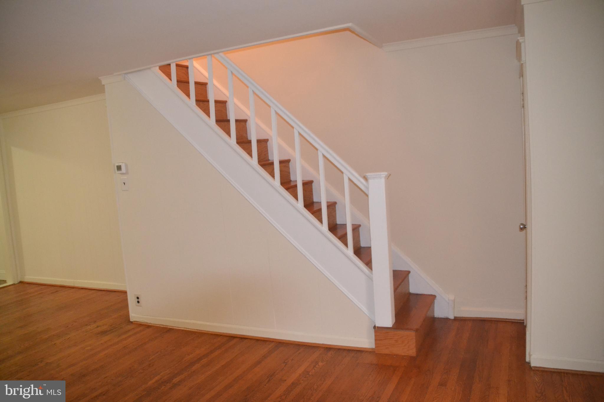6936 Guilford Road Upper Darby, PA 19082 - Photo 7 of 37 Stairs leading to the second floor.