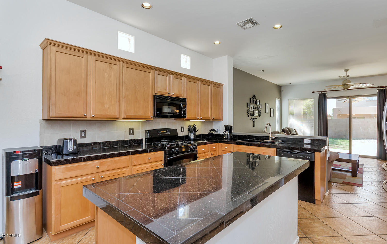 2103 North Rascon Loop Phoenix, AZ 85037 - Photo 11 of 35 2103 N Rascon Loop-large-011-16-Kitchen-