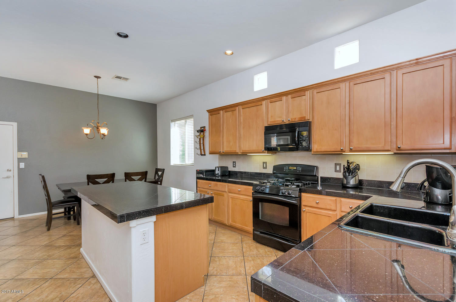 2103 North Rascon Loop Phoenix, AZ 85037 - Photo 13 of 35 2103 N Rascon Loop-large-013-27-Kitchen-