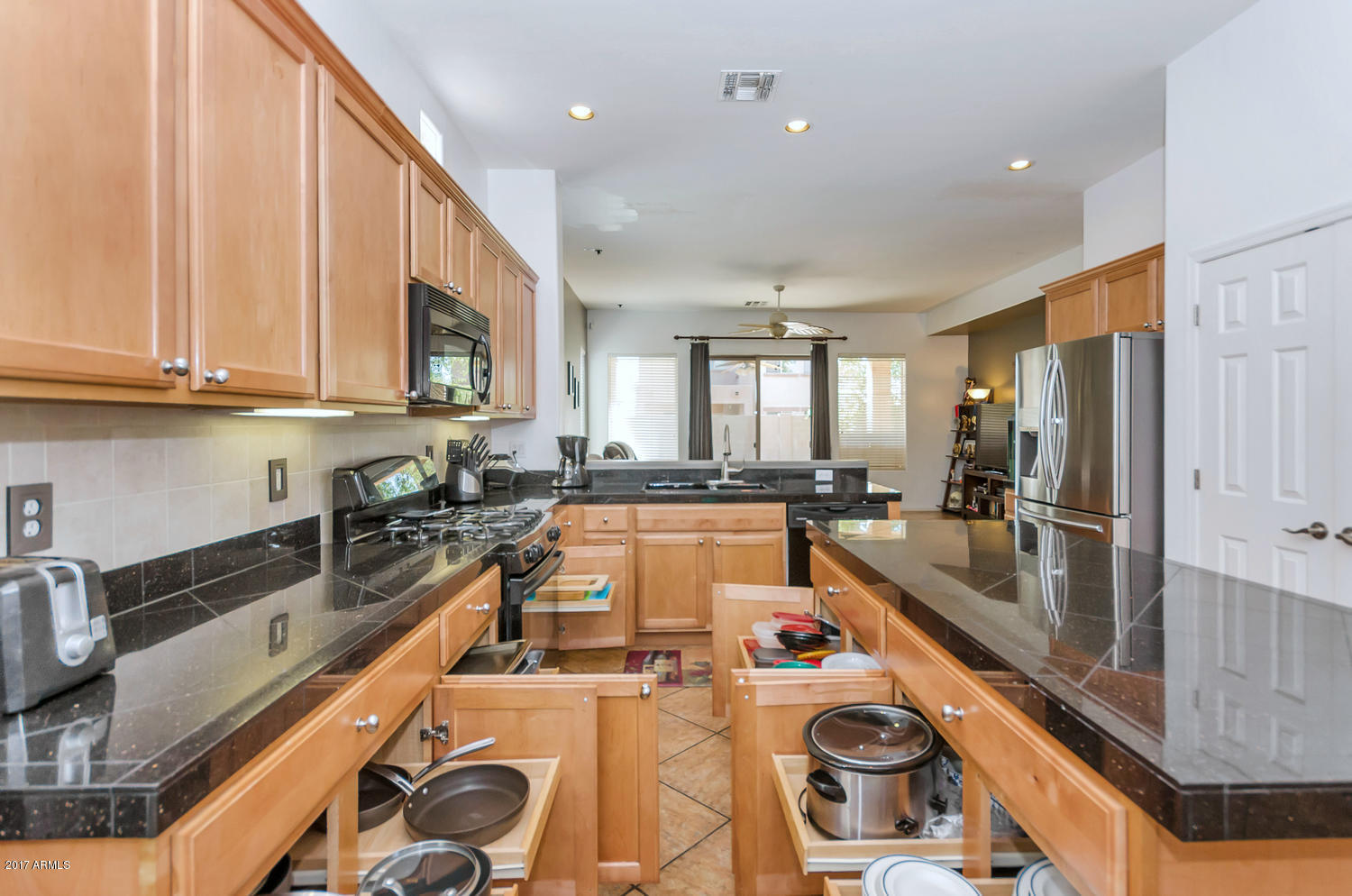 2103 North Rascon Loop Phoenix, AZ 85037 - Photo 14 of 35 2103 N Rascon Loop-large-014-35-Kitchen-