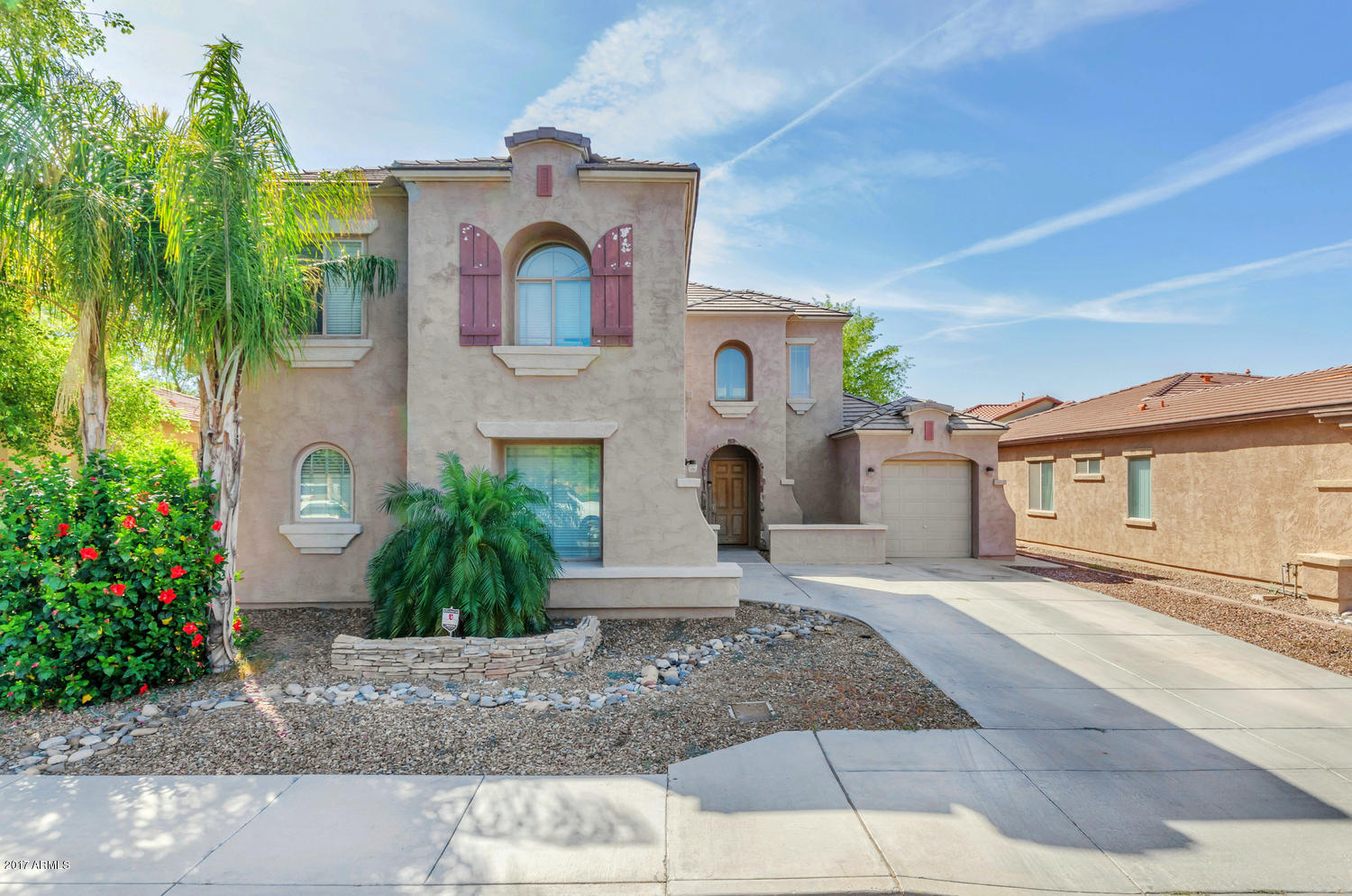 2103 North Rascon Loop Phoenix, AZ 85037 - Photo 2 of 35 2103 N Rascon Loop-large-002-32-Front Ex