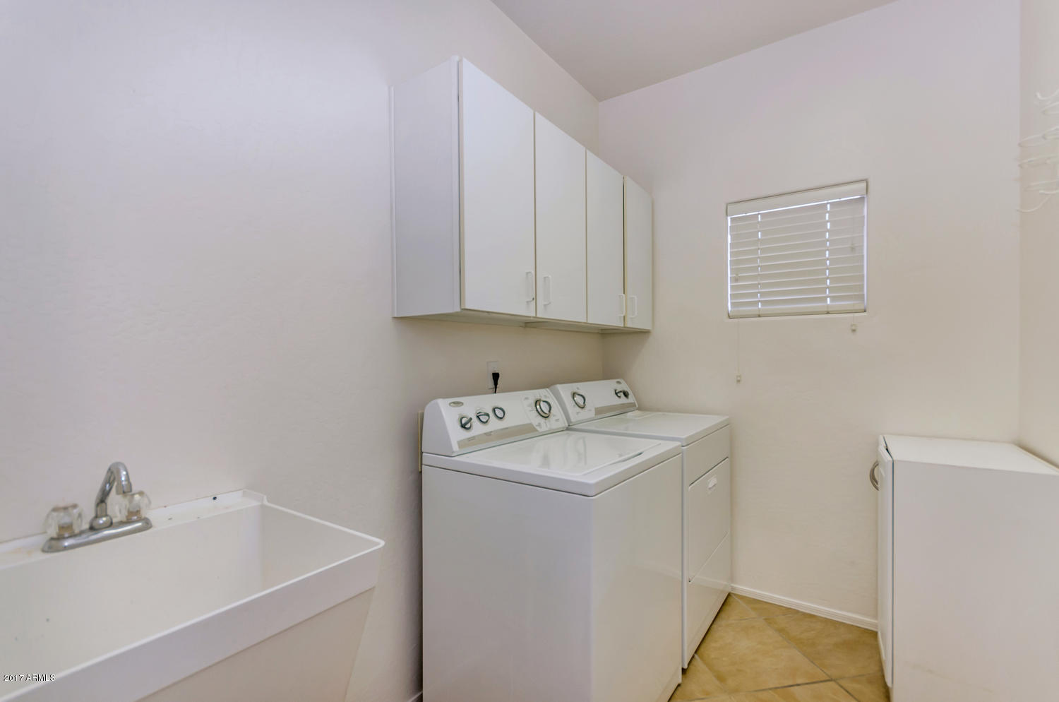 2103 North Rascon Loop Phoenix, AZ 85037 - Photo 28 of 35 2103 N Rascon Loop-large-028-13-Laundry-