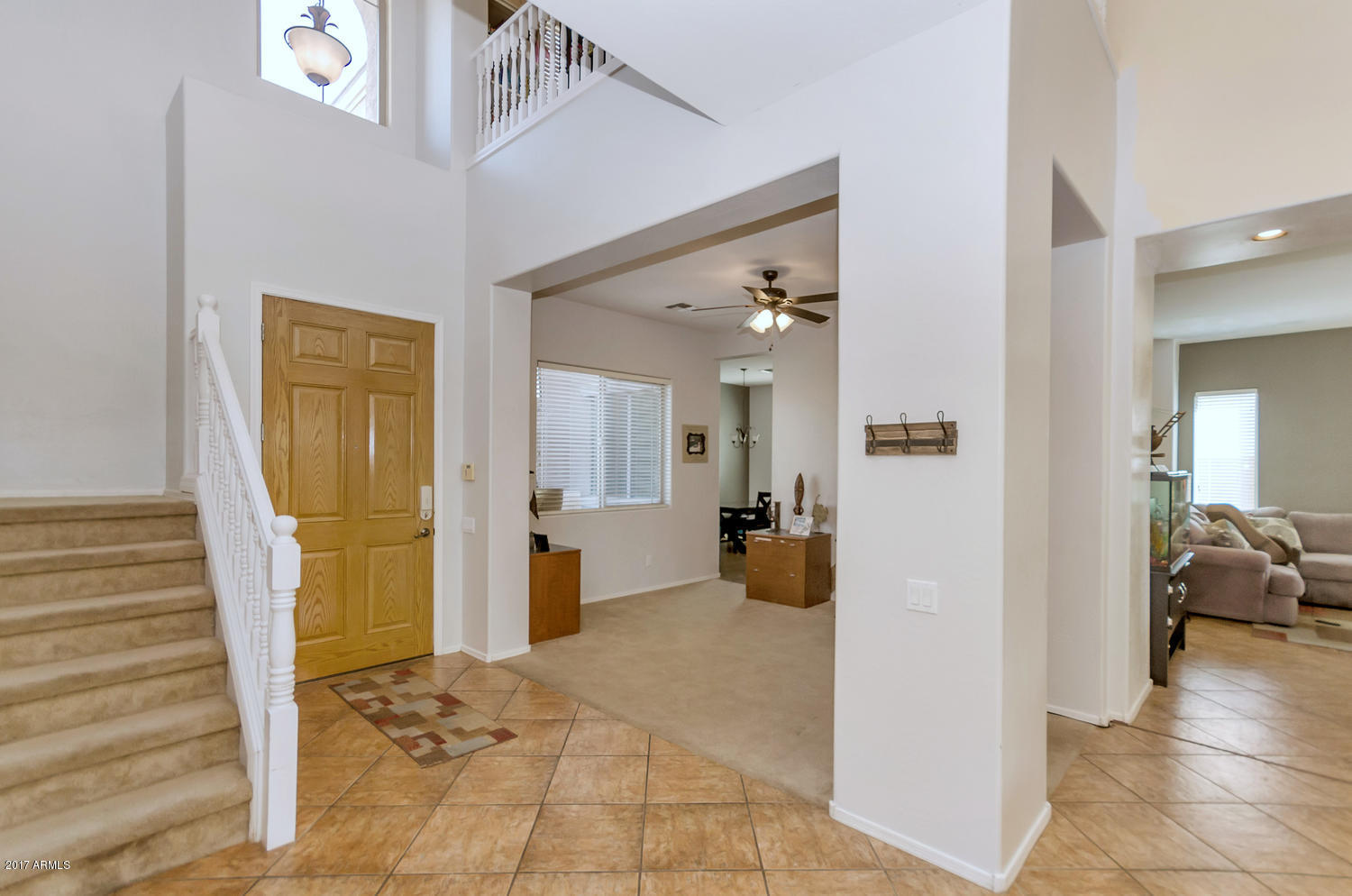 2103 North Rascon Loop Phoenix, AZ 85037 - Photo 3 of 35 2103 N Rascon Loop-large-003-19-Entryway
