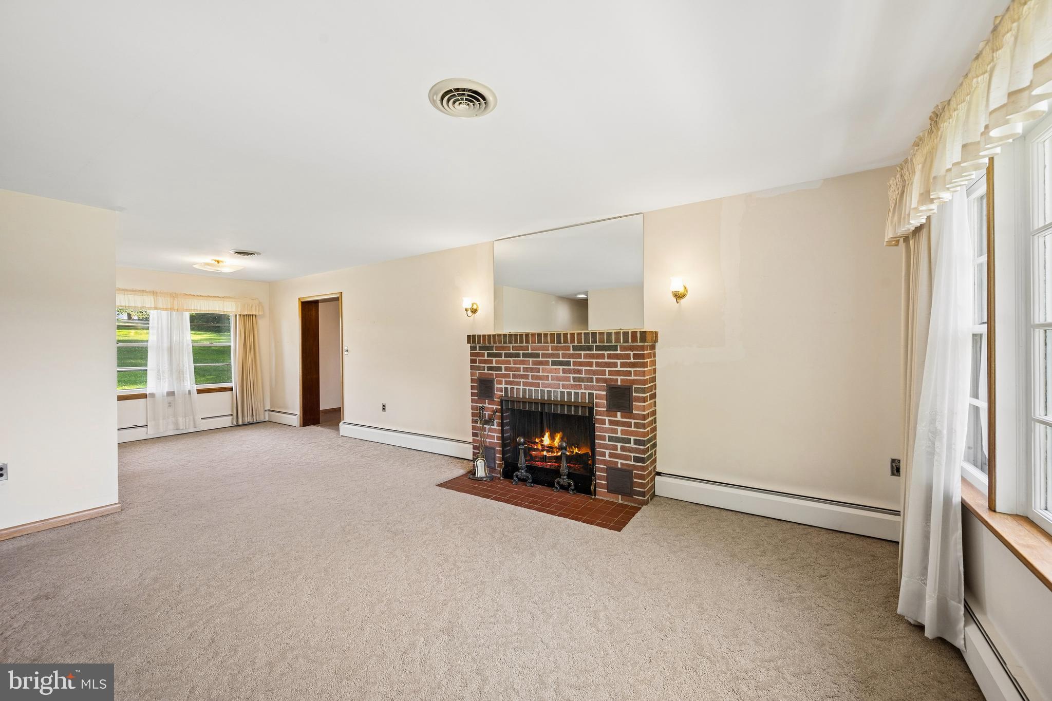 30 Coulter Lane Rising Sun, MD 21911 - Photo 9 of 45 Spacious living room with wood burning fireplace.