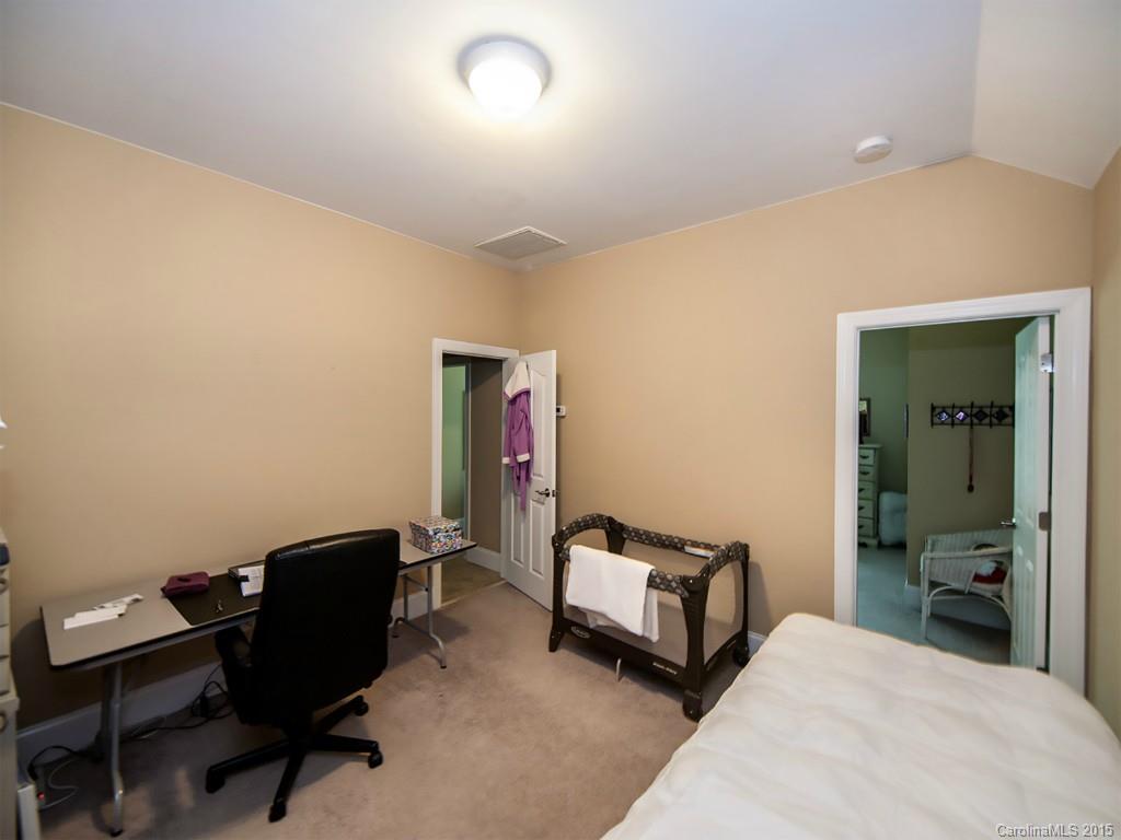608 Crosswater Lane, Unit 608 Fort Mill, SC 29708 - Photo 12 of 20 a bedroom with furniture and a piano
