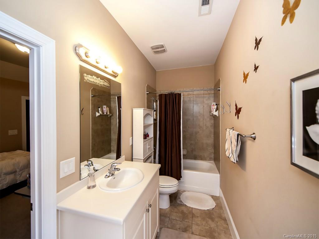 608 Crosswater Lane, Unit 608 Fort Mill, SC 29708 - Photo 14 of 20 a bathroom with a sink toilet and shower