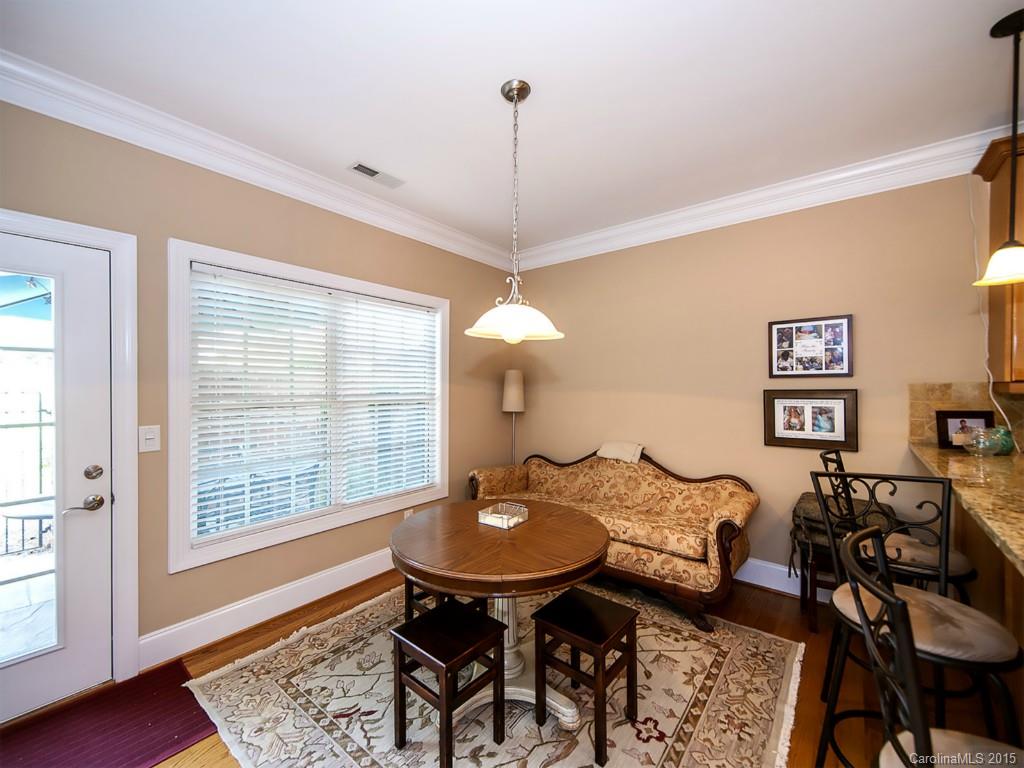 608 Crosswater Lane, Unit 608 Fort Mill, SC 29708 - Photo 15 of 20 a dining room with furniture and window