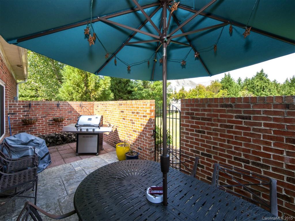 608 Crosswater Lane, Unit 608 Fort Mill, SC 29708 - Photo 18 of 20 a view of backyard with outdoor seating and plants