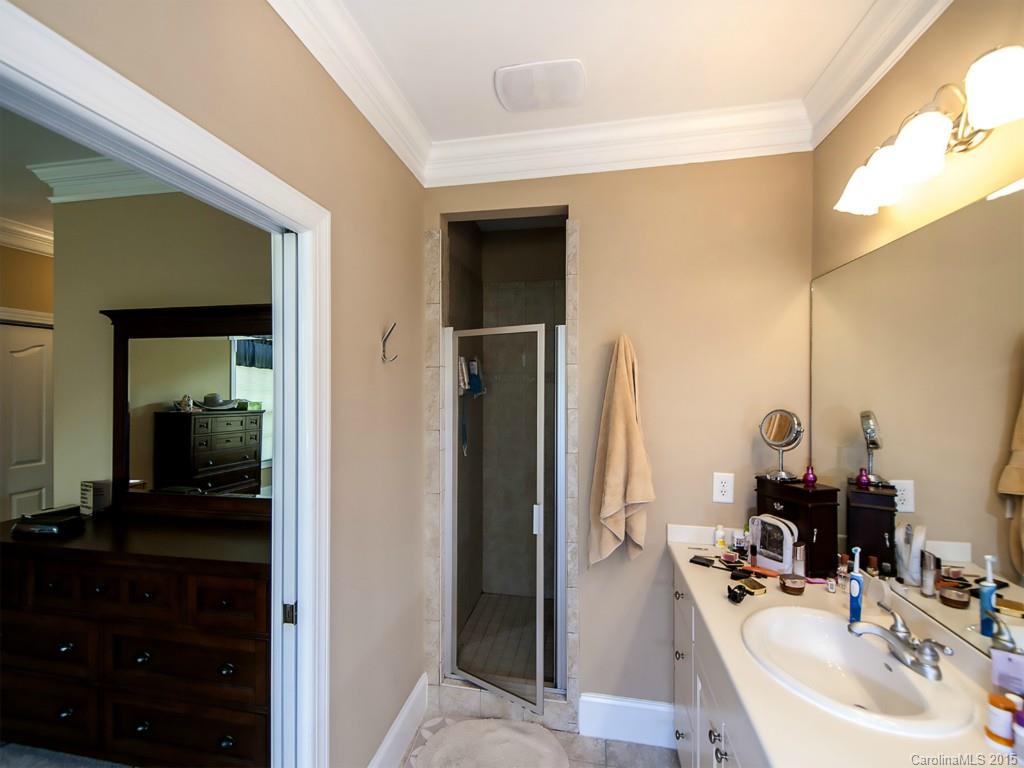 608 Crosswater Lane, Unit 608 Fort Mill, SC 29708 - Photo 9 of 20 a bathroom with a sink and a mirror