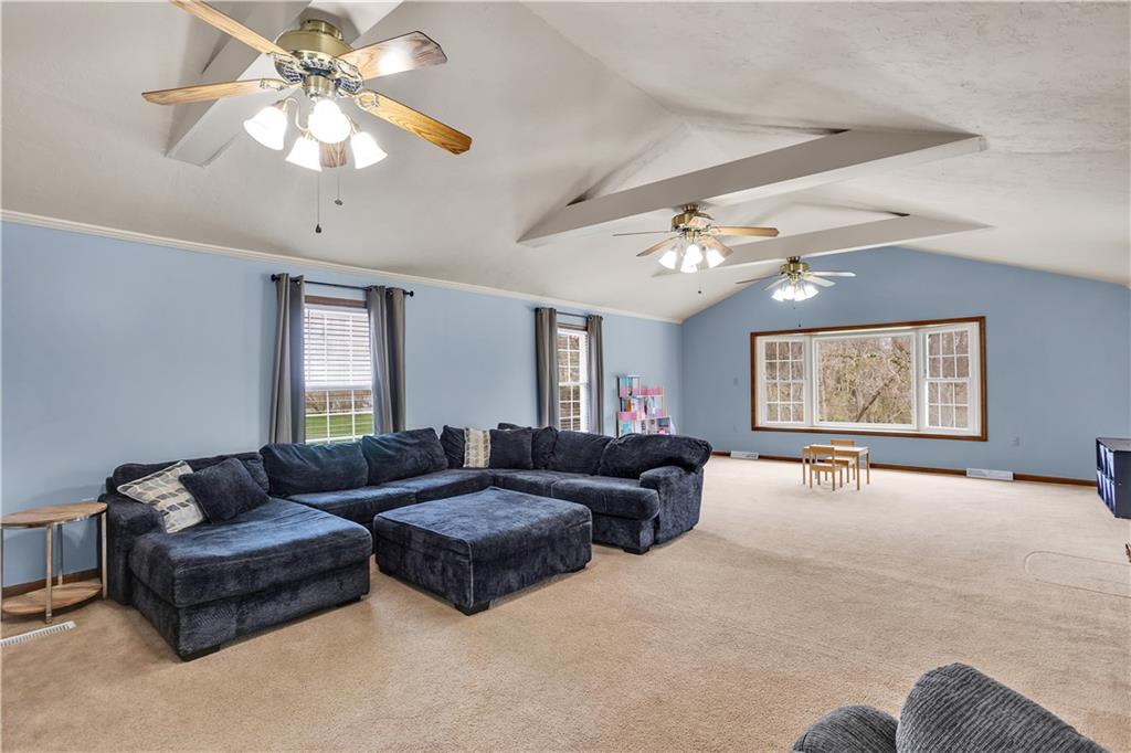 362 Trinity Drive Washington, PA 15301 - Photo 12 of 34 You will never want to leave this huge living room with cathedral ceilings. It has direct access to the fenced in side and back yard.