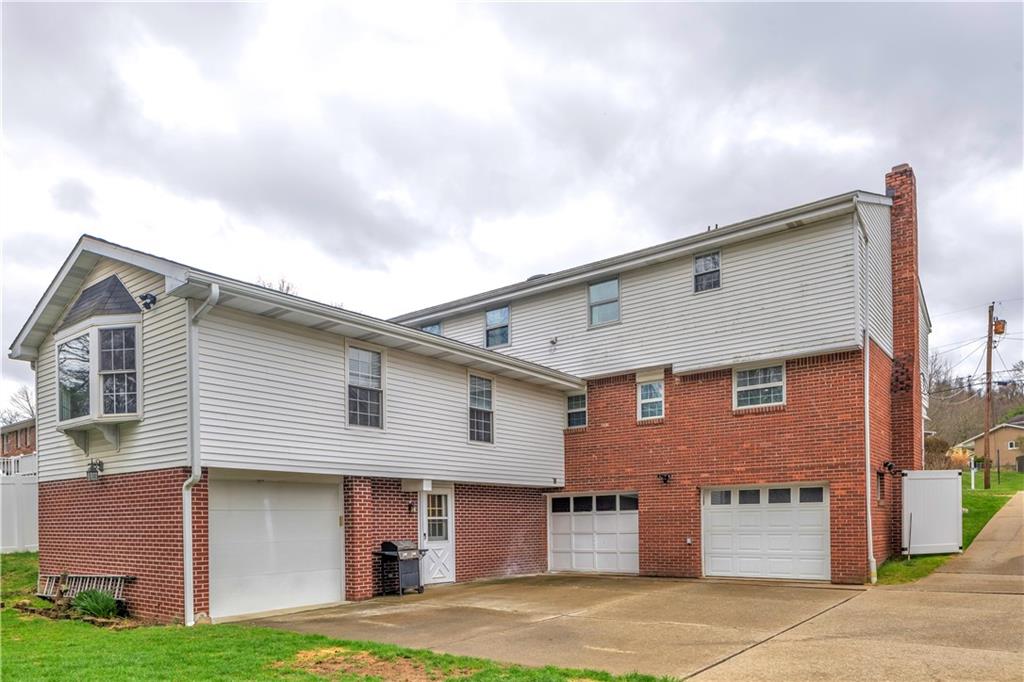 362 Trinity Drive Washington, PA 15301 - Photo 3 of 34 Enjoy the 3 car garages and immense storage with insulated workshop the home has to offer