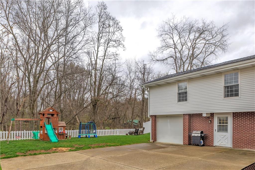 362 Trinity Drive Washington, PA 15301 - Photo 31 of 34 Back yard is fully fenced in with privacy fencing on the sides between neighboring houses