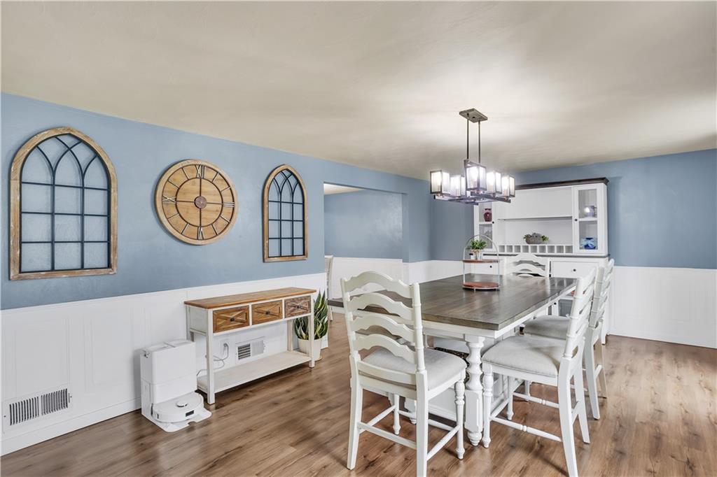 362 Trinity Drive Washington, PA 15301 - Photo 4 of 34 The home offers a large dining room with newly installed light fixture, wainscoting and fresh paint