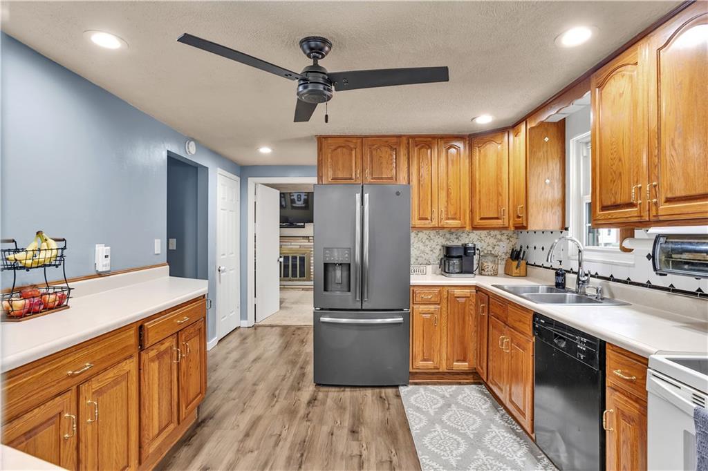 362 Trinity Drive Washington, PA 15301 - Photo 9 of 34 The vinyl flooring continues through the kitchen on the main floor