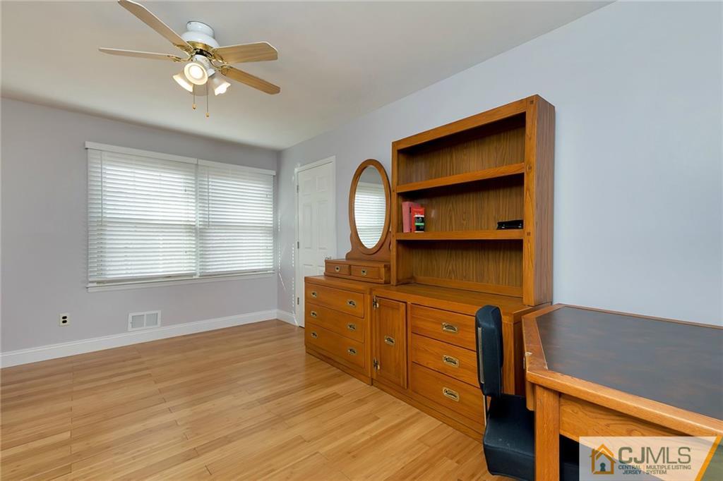 1265 Brookside Road Piscataway, NJ 08854 - Photo 16 of 25 a view of room with window and wooden floor
