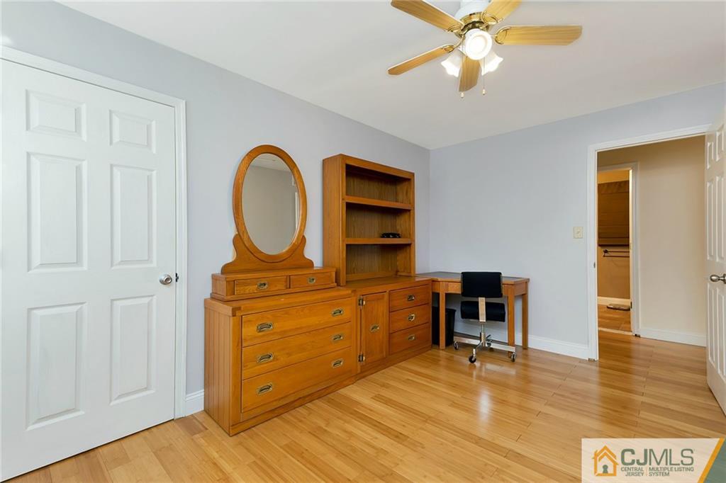 1265 Brookside Road Piscataway, NJ 08854 - Photo 17 of 25 a view of a workspace with furniture and wooden floor