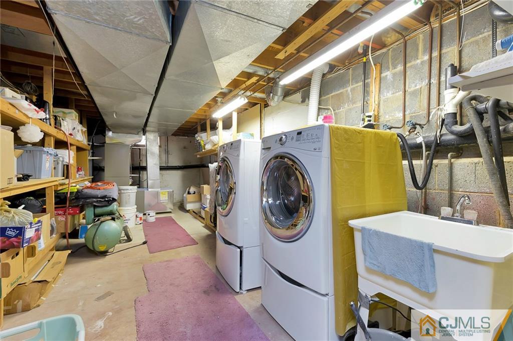 1265 Brookside Road Piscataway, NJ 08854 - Photo 20 of 25 a utility room with dryer and washer