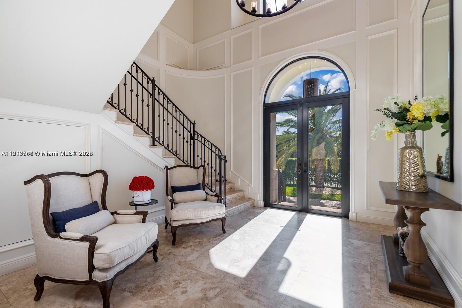 16433 Northeast 31st Avenue North Miami Beach, FL 33160 - Photo 3 of 8 a bedroom with furniture and a window