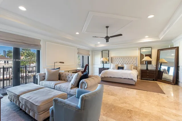 a spacious bathroom with a tub sink and mirror